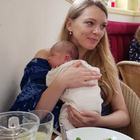 Counsellor, Celia Jarvis of Cappuccino Counselling,, holding her new born son.